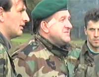 Палача защищают американцы